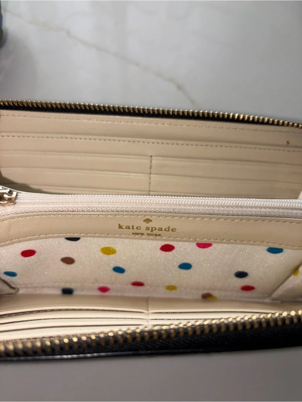 Kate Spade Madison black full zip wallet gold accents polka dot lining